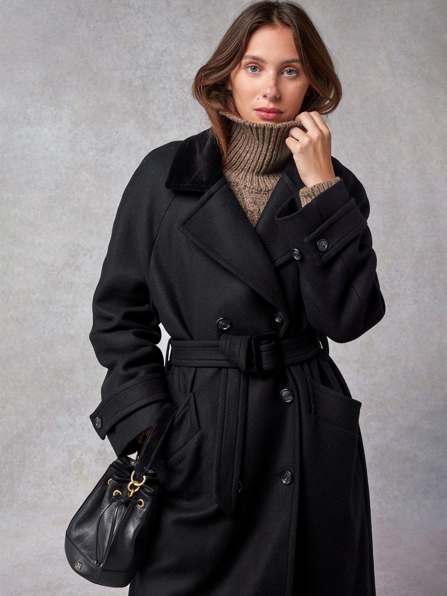 Oversized double-breasted and belted black wool coat | Rouje