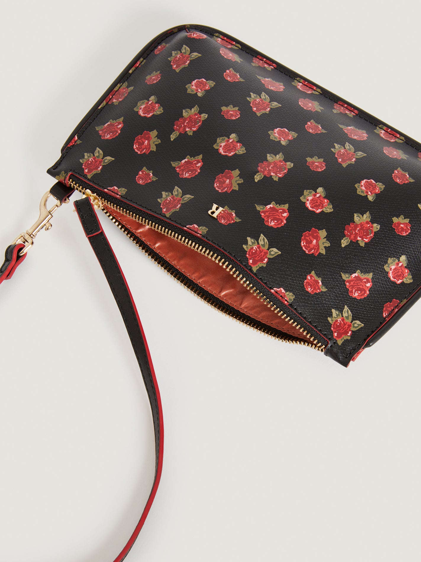 Mini clutch bag in floral printed leather | Rouje • Rouje Paris