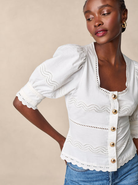 Openwork and embroidered cotton top with balloon sleeves | Rouje