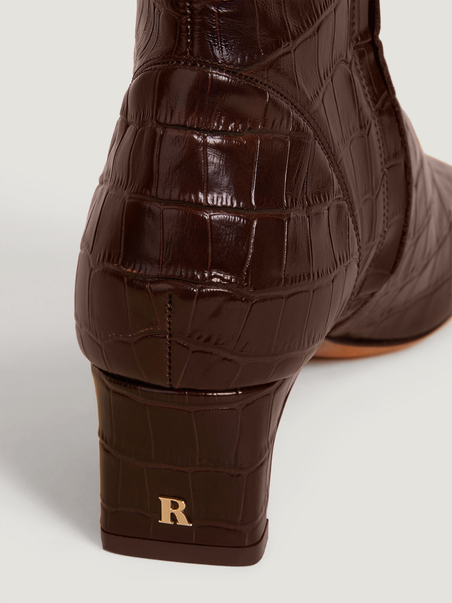 Brown crocodile effect leather boots