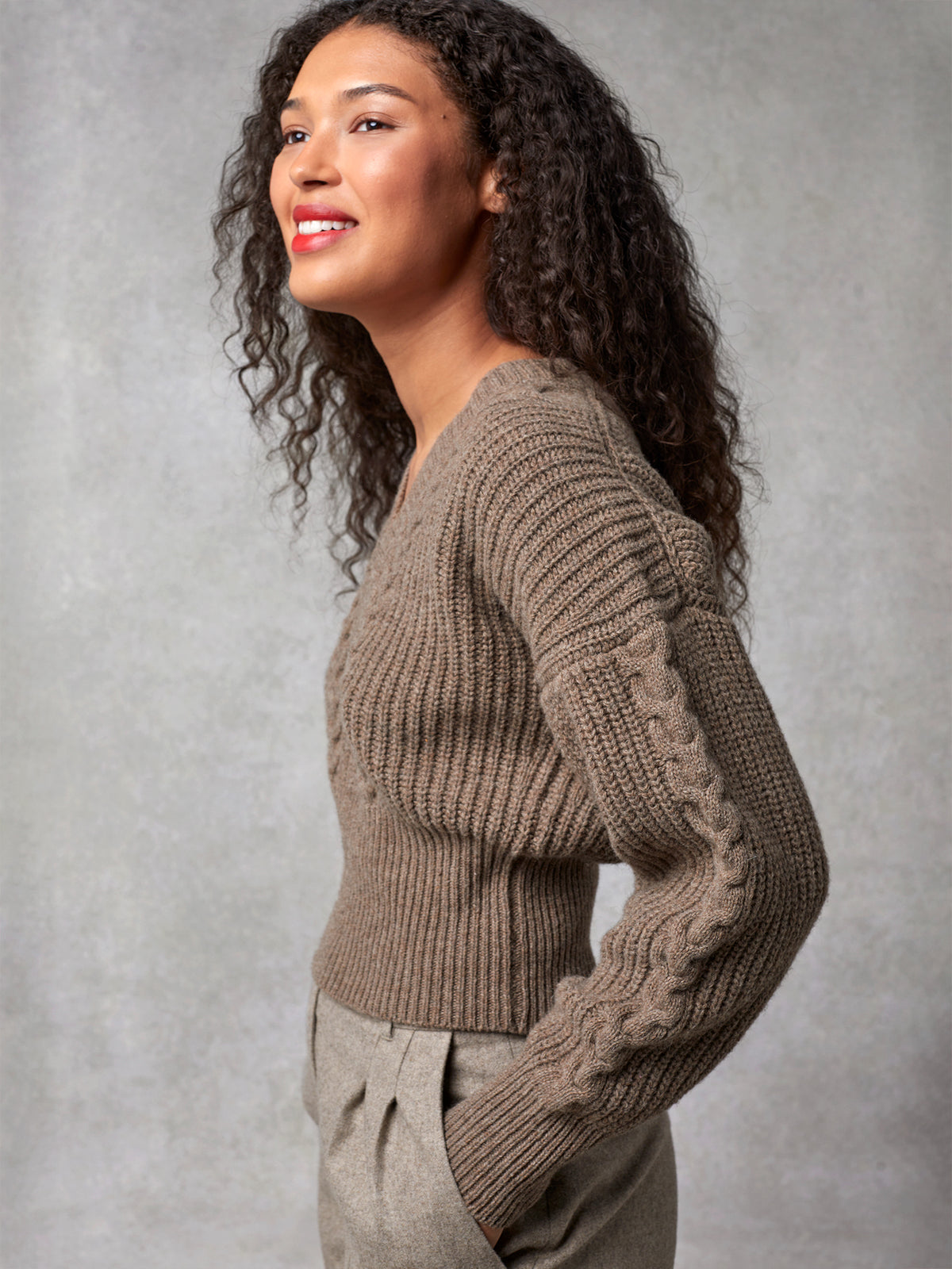 Short cable knit sweater